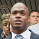 NFL running back Adrian Peterson of the Minnesota Vikings addresses the media after pleading no contest to a lesser misdemeanor charge of reckless assault Nov. 4, 2014, in Conroe, Texas.
Bob Levey/Getty Images